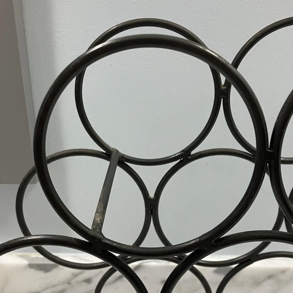Gray Metal Wine Rack- 7 bottle, free standing, honeycomb style, circular, 4 legs